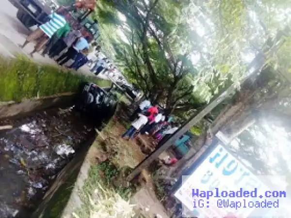 Photo: Woman survives after she veered off the road and fell into an open drainage in Calabar